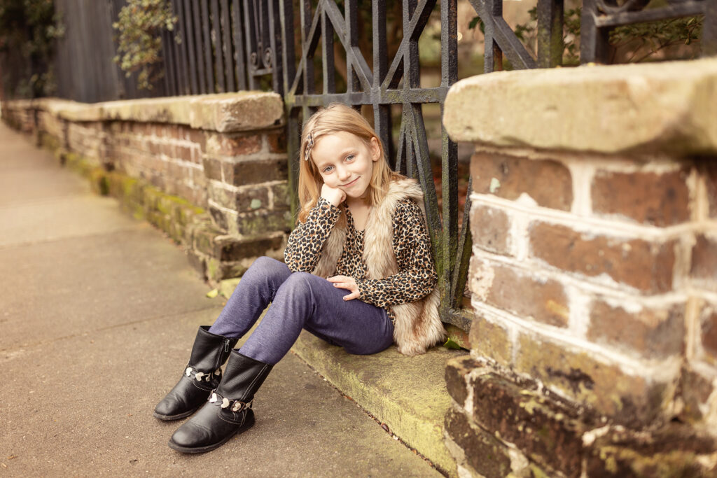 Charleston South Carolina, downtown Charleston south Carolina, photographer in Charleston South Carolina, Greenville South Carolina photographer, photographer in South Carolina, senior photographer in South Carolina, wedding photographer South Carolina, family photographer South Carolina, family photographer Charleston south Carolina, child modeling on brick sidewalk Charleston South Carolina 